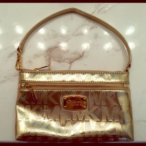 Michael Kors gold clutch